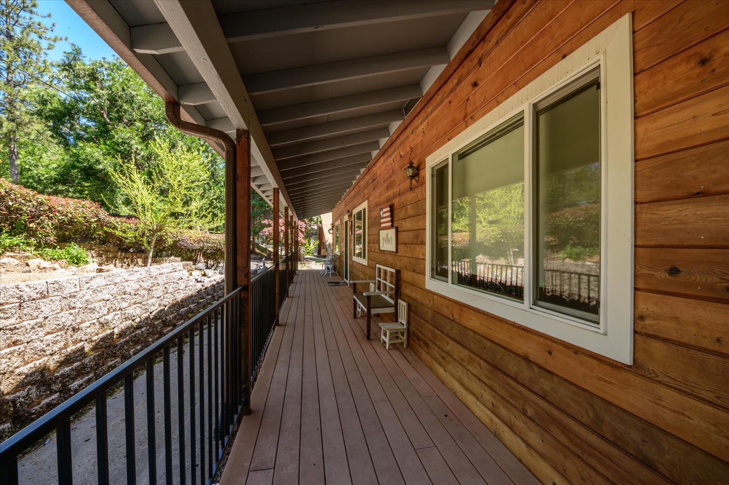 6480 Granite Trail Pollock Pines, CA 95726 - Photo 4 of 23 a view of a porch with wooden floor