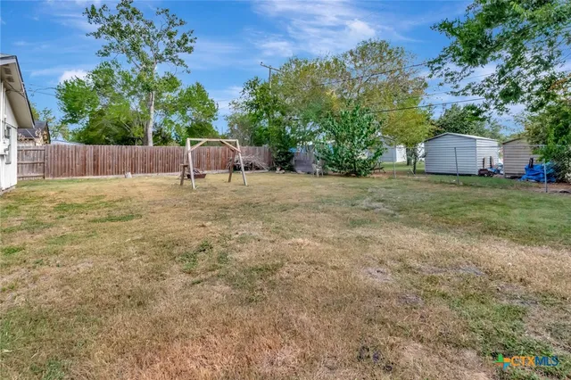 a house with trees in front of it