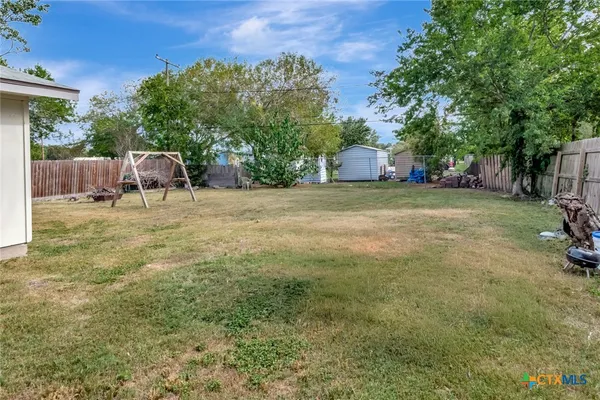 a house with trees in front of it
