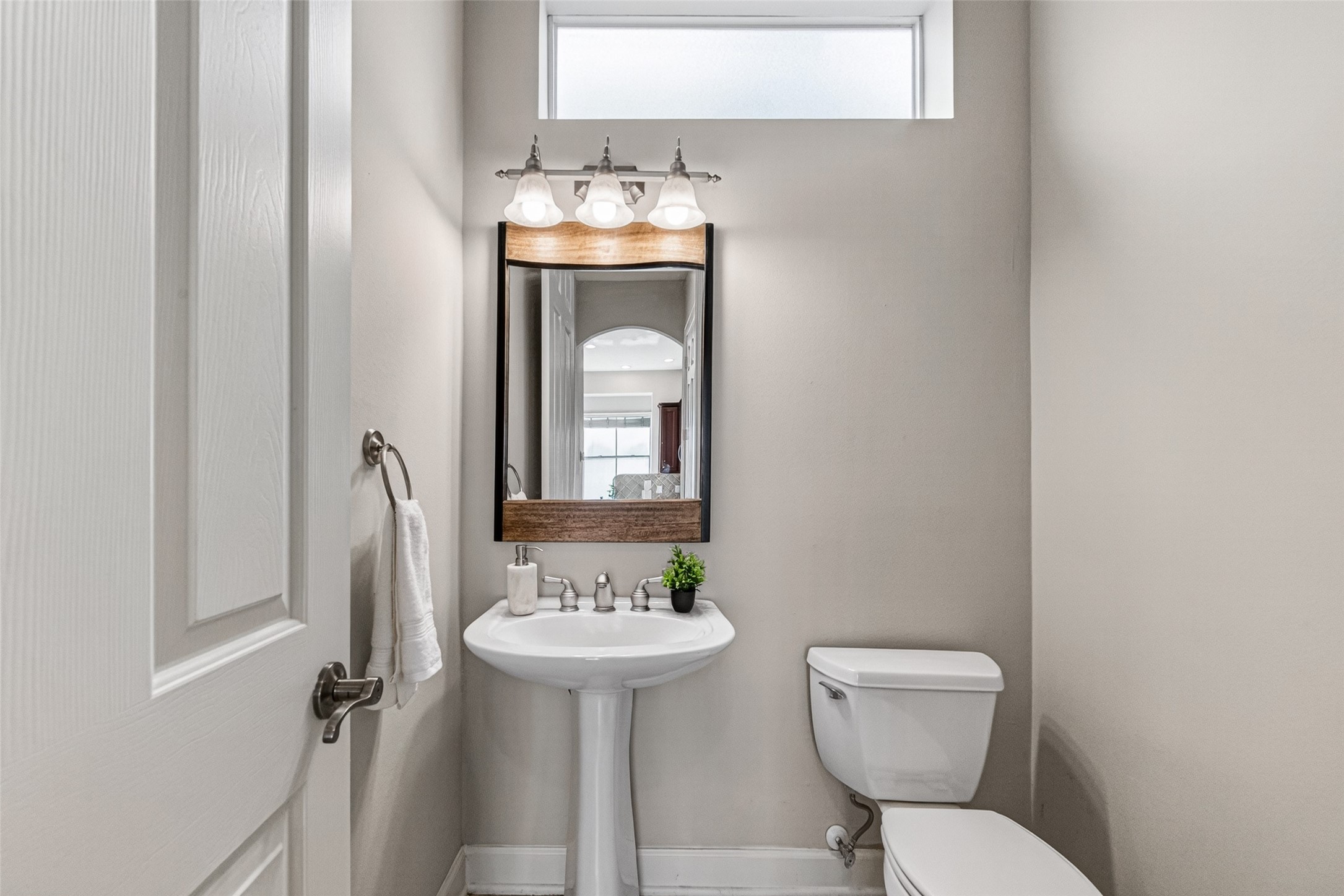 4502 Rose Street Houston, TX 77007 - Photo 19 of 40 Half bathroom tucked away on second floor.