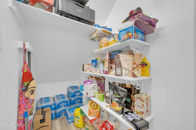 a view of a backyard with sitting area