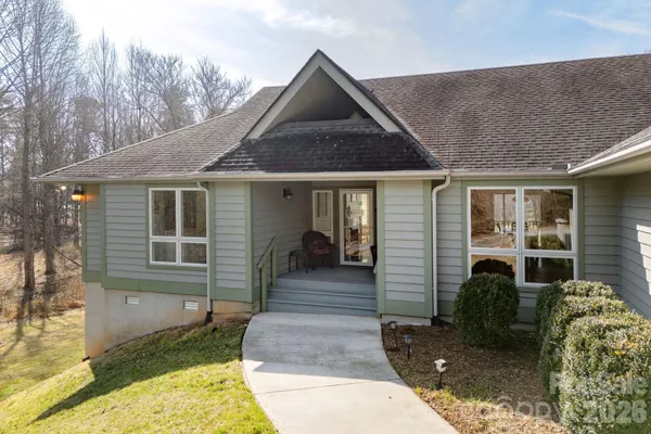 a front view of a house with yard