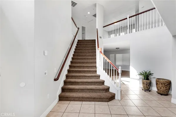 a view of livingroom with furniture and stairs