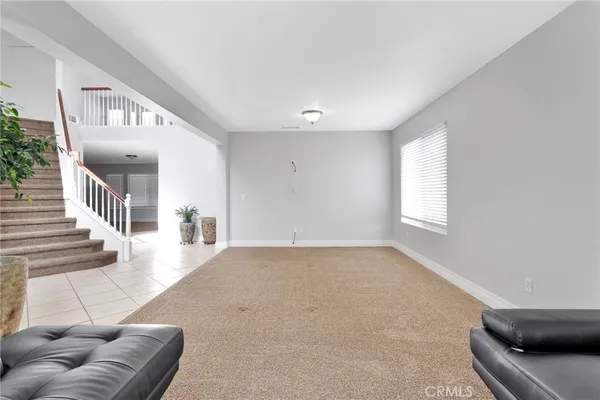 a kitchen with stainless steel appliances a stove top oven a sink a counter space and cabinets