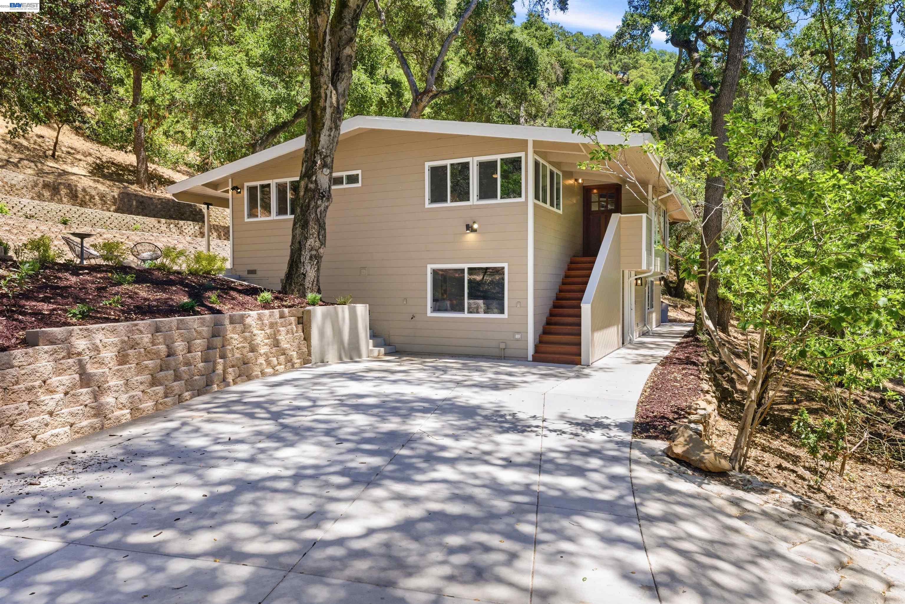 1929 Kilkare Road Sunol, CA 94586 - Photo 4 of 24 a front view of a house with a yard