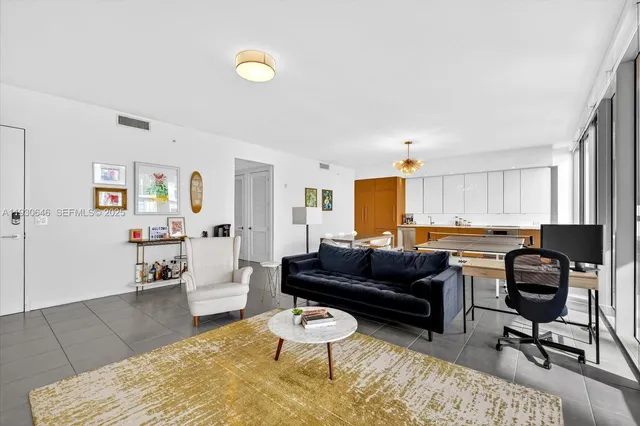 a living room with furniture and a couch