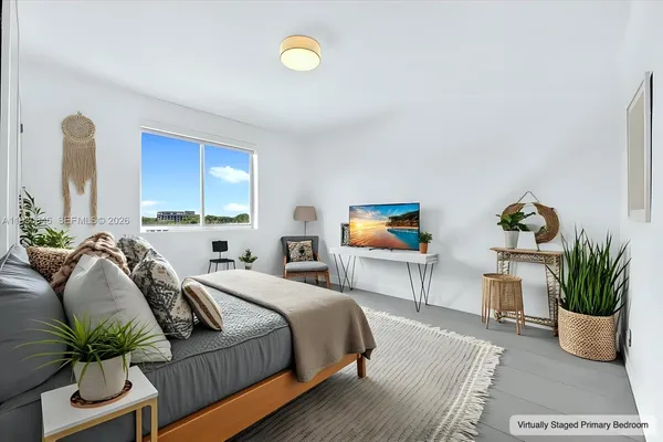 a bathroom with a double vanity sink toilet and shower