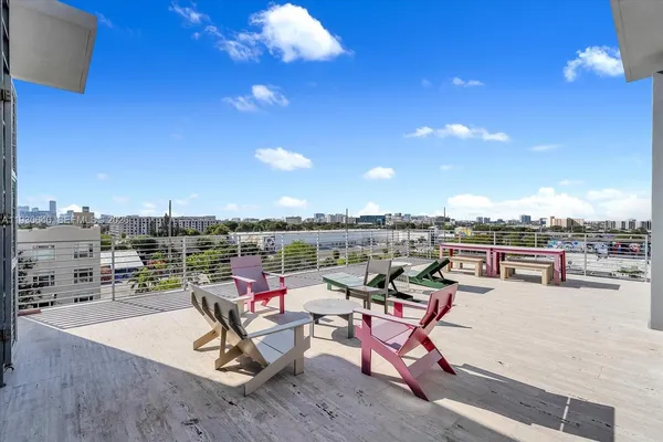 a view of a terrace with furniture and stove