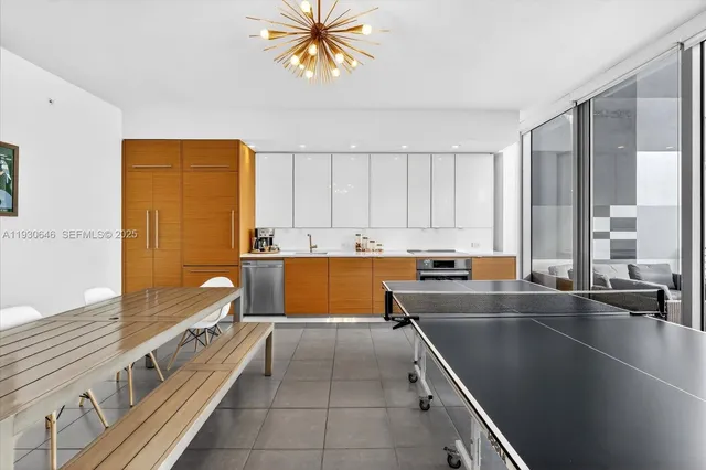 a view of a dining room with furniture and window