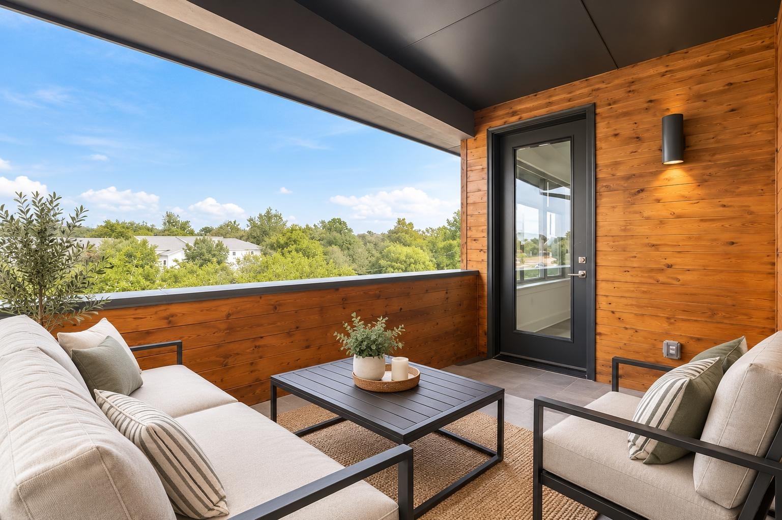 5006 Pecan Springs Road, Unit 7 Austin, TX 78723 - Photo 28 of 38 Rich wood paneling and stone tile flooring line this covered outdoor space overlooking treetops. Some photos have been enhanced by AI.