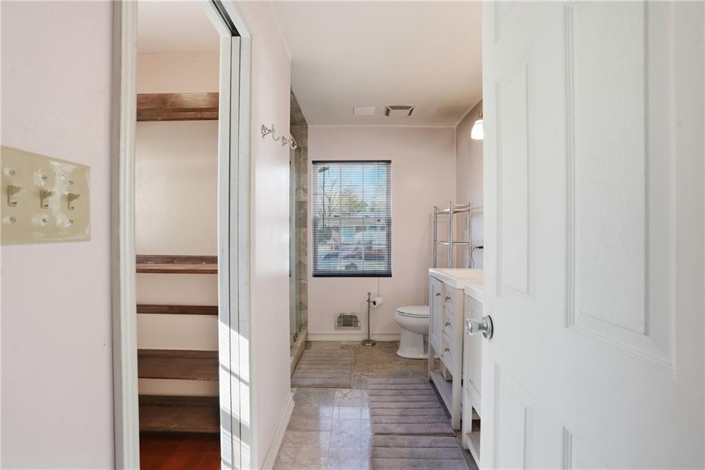 8926 Ashton Road Jonesboro, GA 30238 - Photo 16 of 32 a bathroom with a bathtub