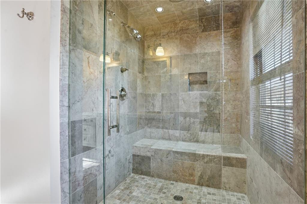 8926 Ashton Road Jonesboro, GA 30238 - Photo 18 of 32 a bathroom with a shower