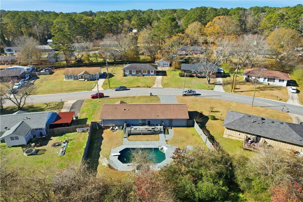 8926 Ashton Road Jonesboro, GA 30238 - Photo 27 of 32 an aerial view of a house with yard swimming pool and outdoor seating
