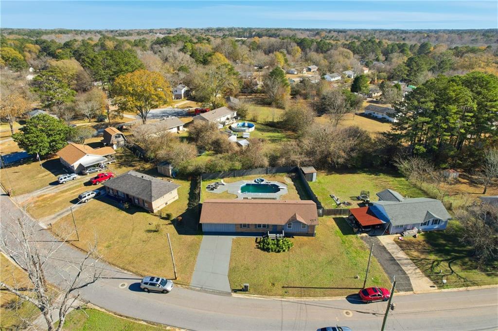 8926 Ashton Road Jonesboro, GA 30238 - Photo 28 of 32 an aerial view of residential houses with outdoor space