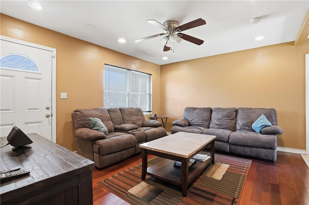 8926 Ashton Road Jonesboro, GA 30238 - Photo 3 of 32 a living room with furniture and a wooden floor