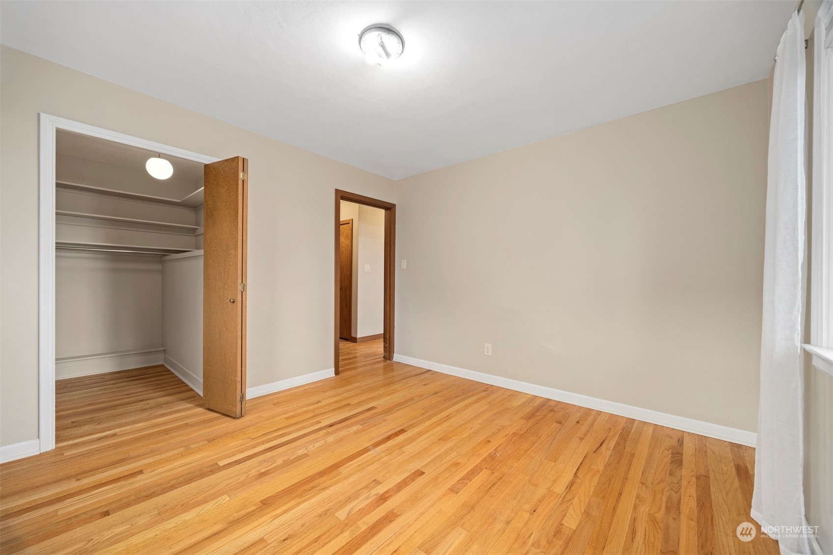 911 17th Street Bellingham, WA 98225 - Photo 15 of 39 a view of empty room with wooden floor