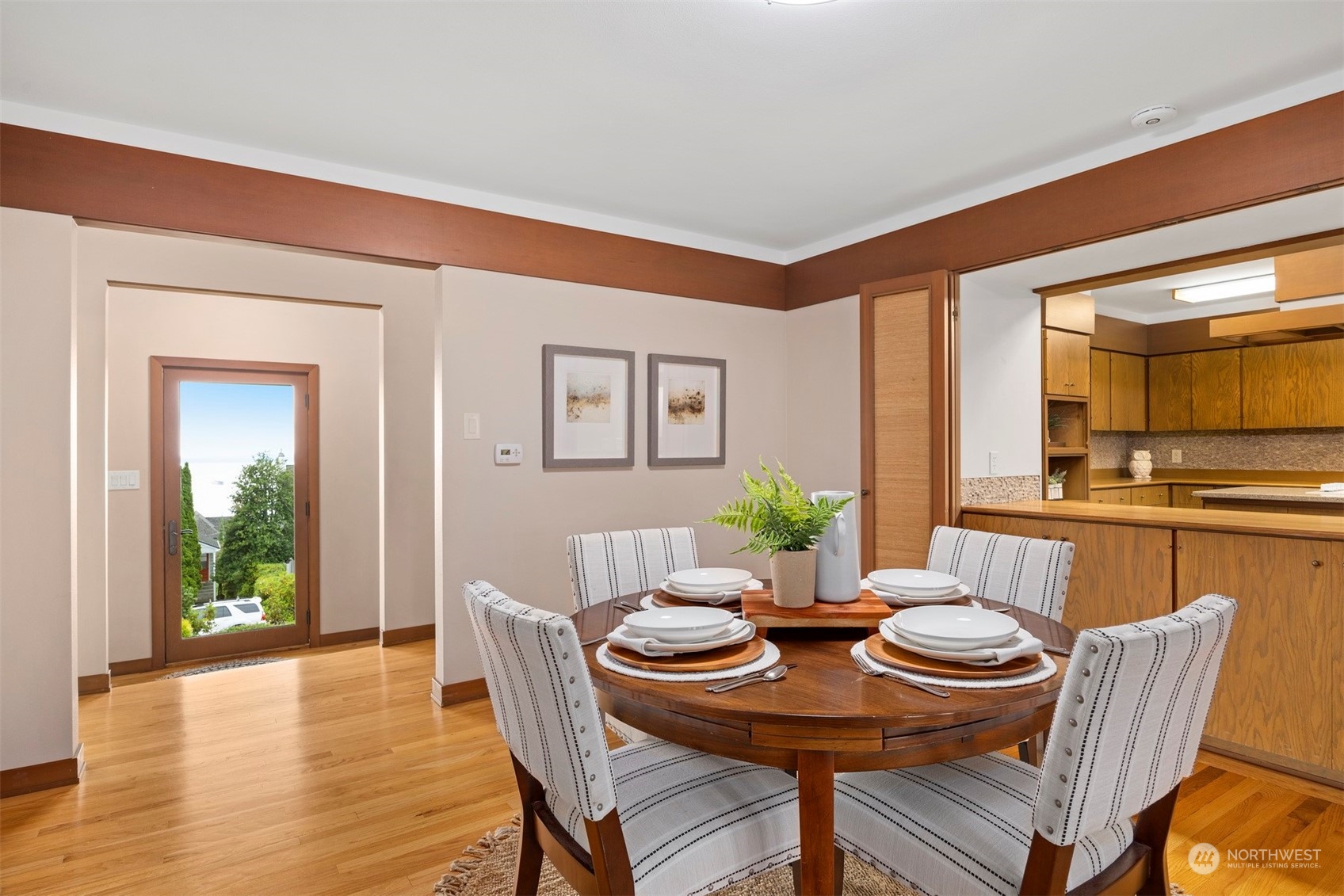 911 17th Street Bellingham, WA 98225 - Photo 28 of 39 a view of a dining room with furniture and wooden floor