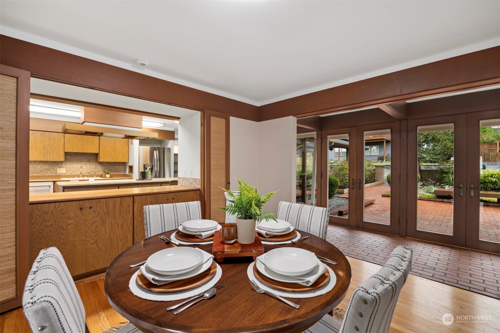 911 17th Street Bellingham, WA 98225 - Photo 29 of 39 a dining room with furniture wooden floor and a rug