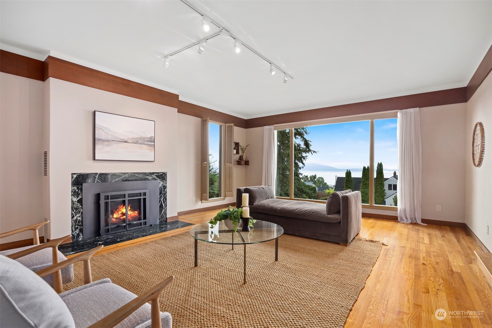911 17th Street Bellingham, WA 98225 - Photo 30 of 39 a living room with furniture and a fireplace