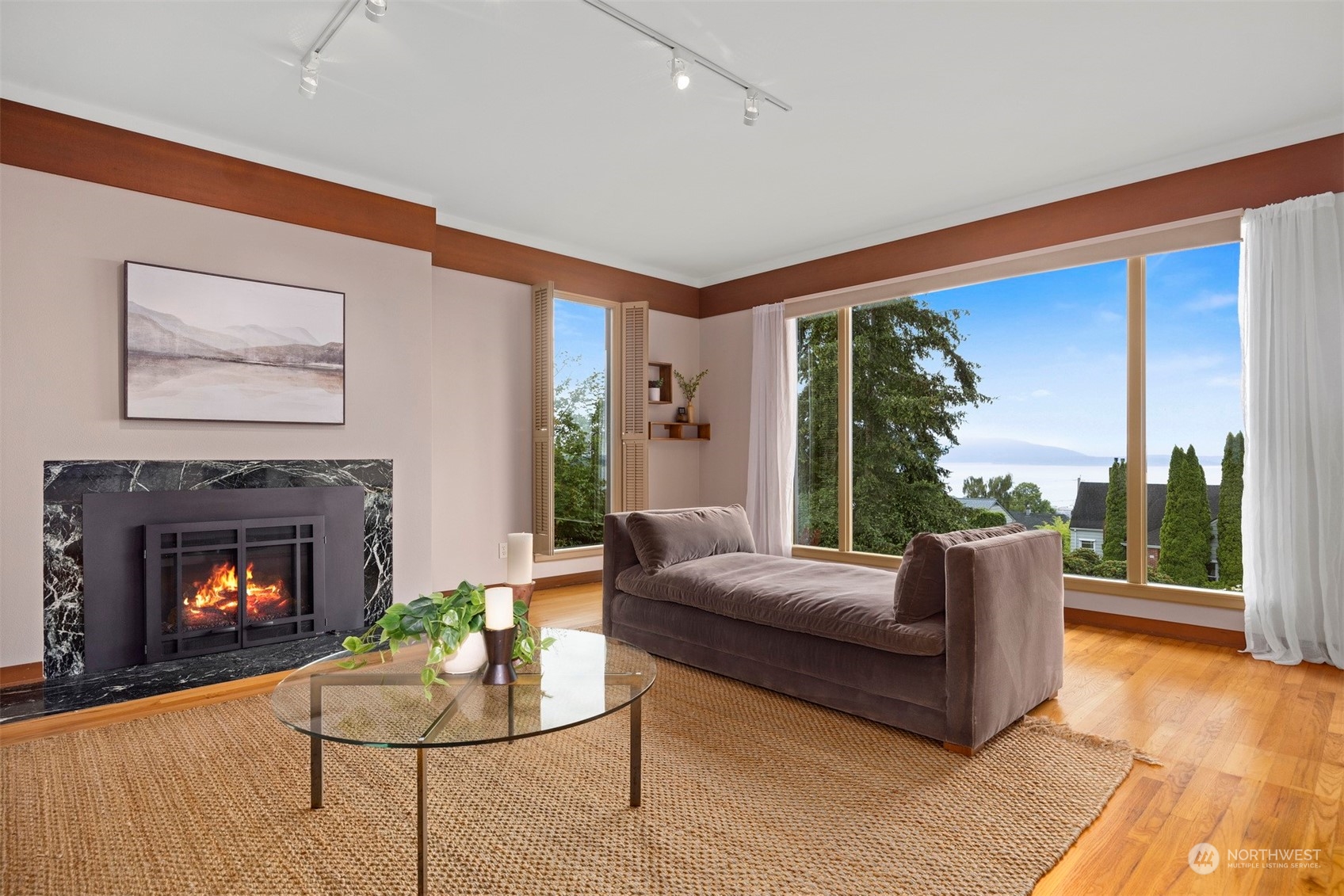 911 17th Street Bellingham, WA 98225 - Photo 31 of 39 a living room with furniture and a fireplace
