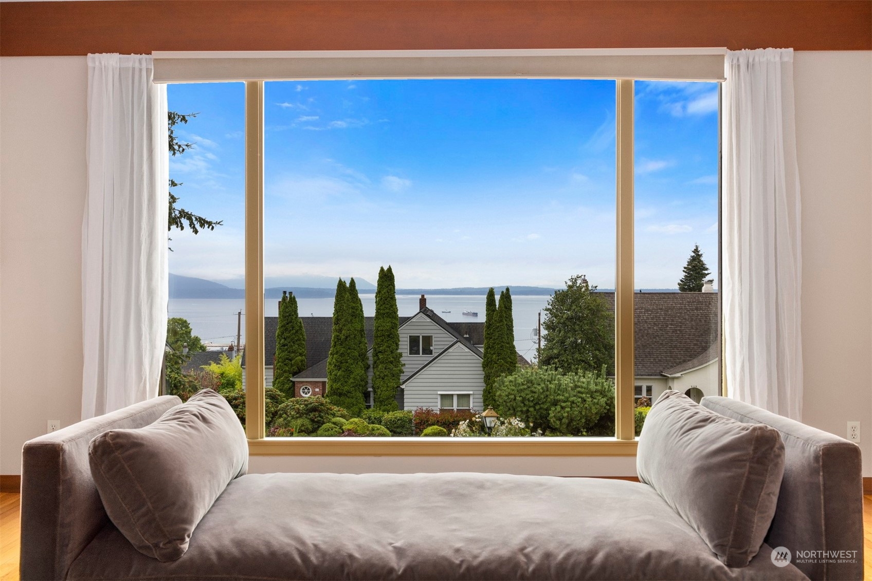 911 17th Street Bellingham, WA 98225 - Photo 33 of 39 a bedroom with furniture and a large window
