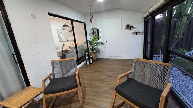 a view of a patio with furniture