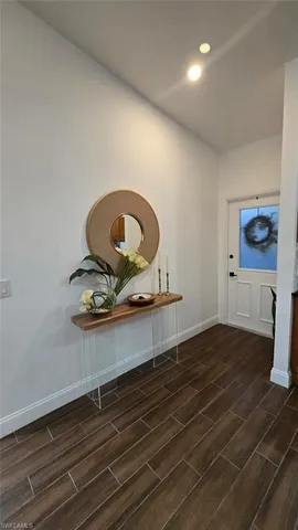 a living room with wooden floor