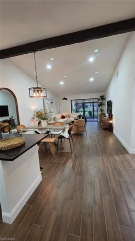 a open kitchen with stainless steel appliances granite countertop a lot of counter space and a sink