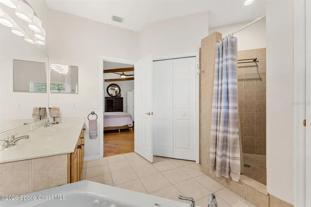 a dining room with furniture water view and a large window