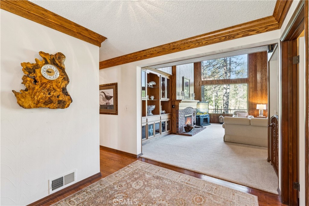 524 Golf Course Road Lake Arrowhead, CA 92352 - Photo 11 of 71 a living room with furniture and large window