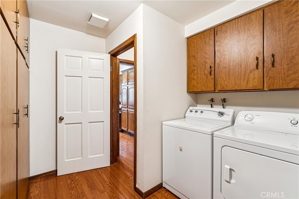 524 Golf Course Road Lake Arrowhead, CA 92352 - Photo 21 of 71 a view of storage and utility room with washer and dryer