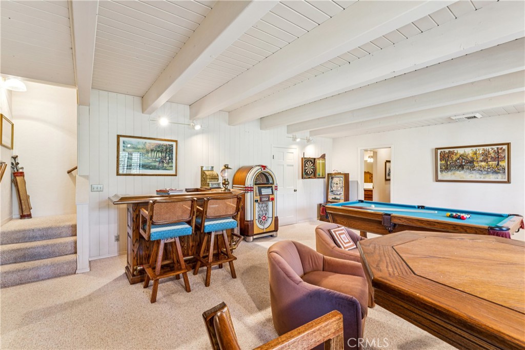 524 Golf Course Road Lake Arrowhead, CA 92352 - Photo 44 of 71 a living room with furniture and a flat screen tv