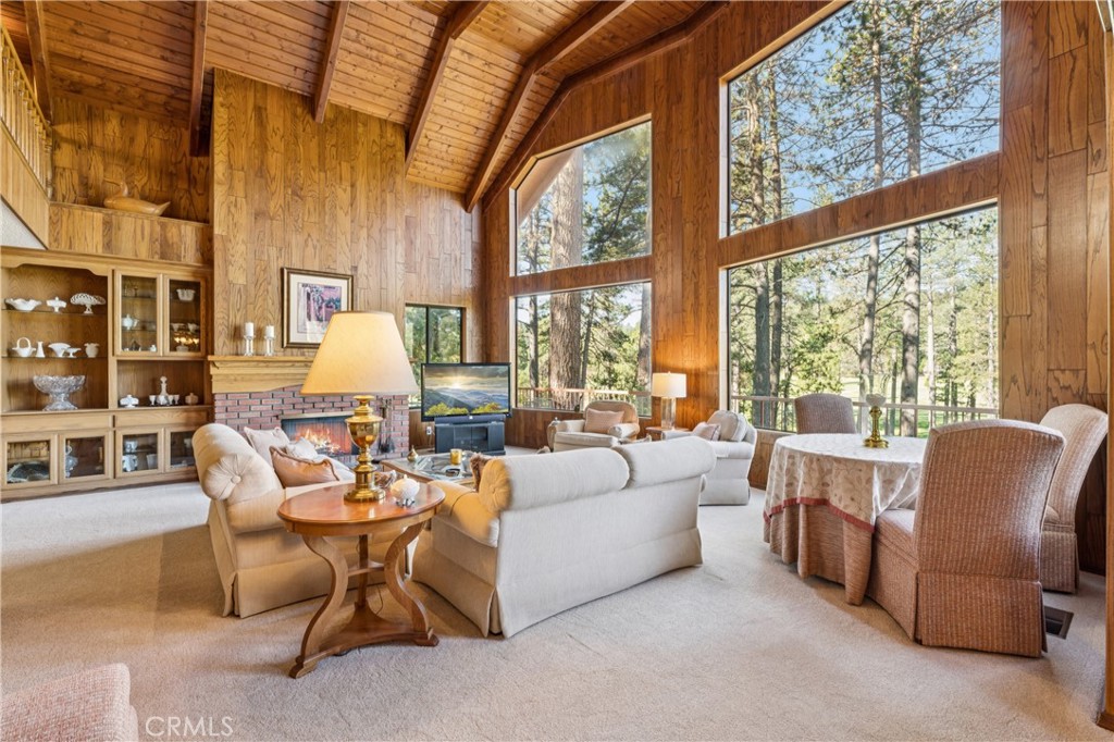 524 Golf Course Road Lake Arrowhead, CA 92352 - Photo 6 of 71 a living room with furniture and a large window