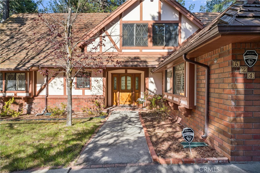 524 Golf Course Road Lake Arrowhead, CA 92352 - Photo 67 of 71 a view of a house with a patio