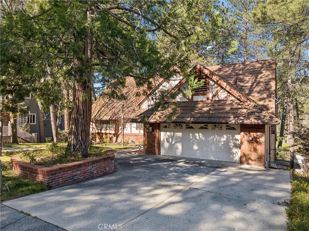524 Golf Course Road Lake Arrowhead, CA 92352 - Photo 69 of 71 a front view of a house with a yard