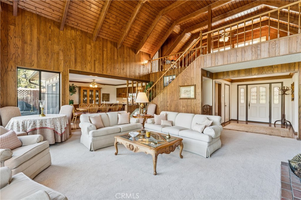 524 Golf Course Road Lake Arrowhead, CA 92352 - Photo 8 of 71 a living room with furniture and a large window