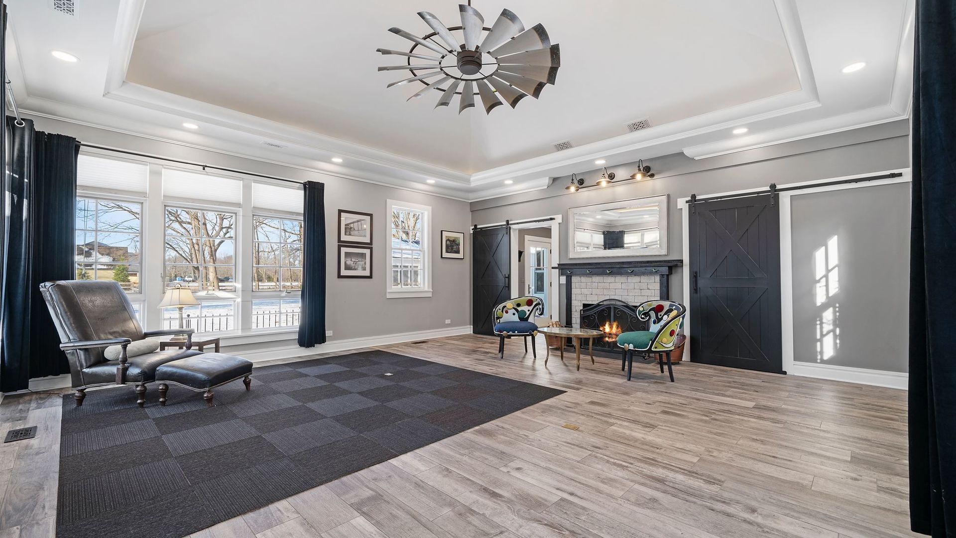 33W179 Surrey Road Wayne, IL 60184 - Photo 12 of 39 a living room with furniture and a fireplace