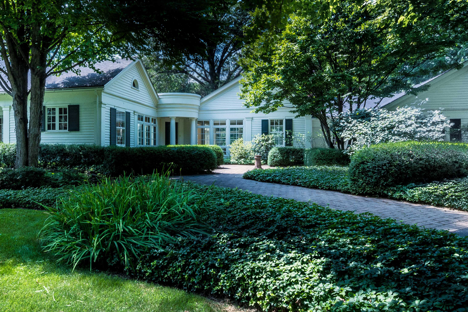 33W179 Surrey Road Wayne, IL 60184 - Photo 28 of 39 a front view of a house with a yard
