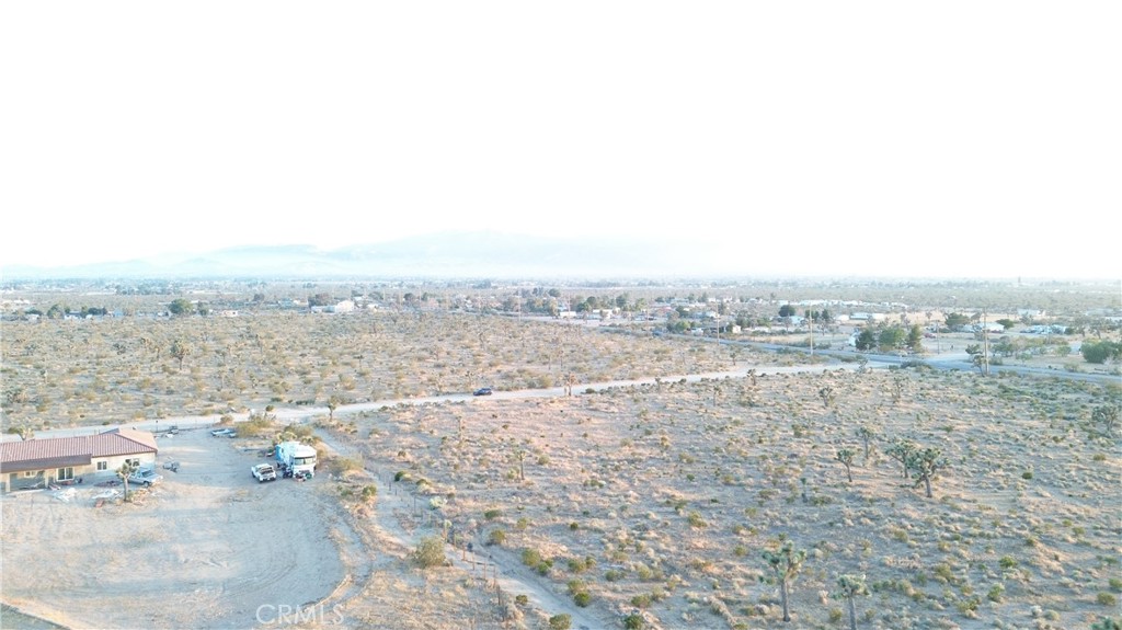 3098 La Mesa Road Phelan, CA 92371 - Photo 2 of 8 an aerial view of residential houses with outdoor space