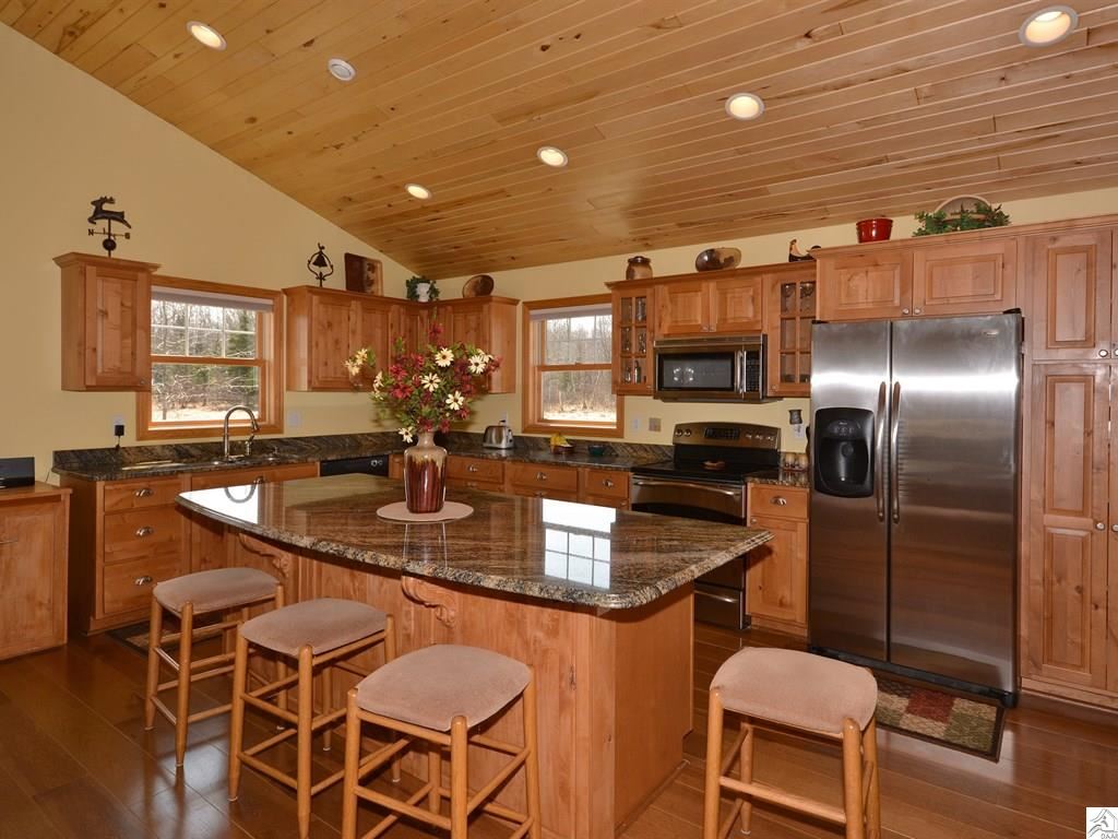 4193 Ugstad Road Hermantown, MN 55811 - Photo 6 of 15 Kitchen wtih Breakfast Bar