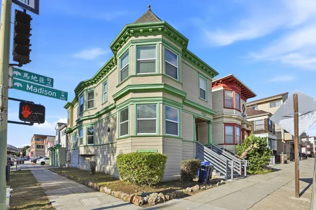 a front view of a multi story residential apartment building