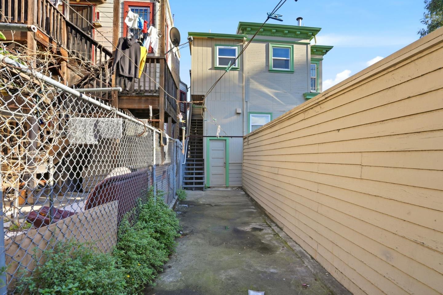 603 Madison Street Oakland, CA 94607 - Photo 40 of 43 a view of a house with a yard