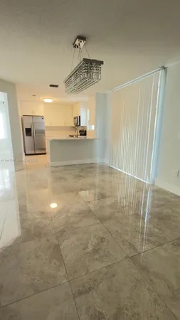 a view of a livingroom with a furniture