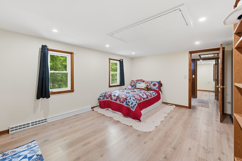 43 Flint Road Tyngsborough, MA 01879 - Photo 18 of 40 a bedroom with a bed and a window