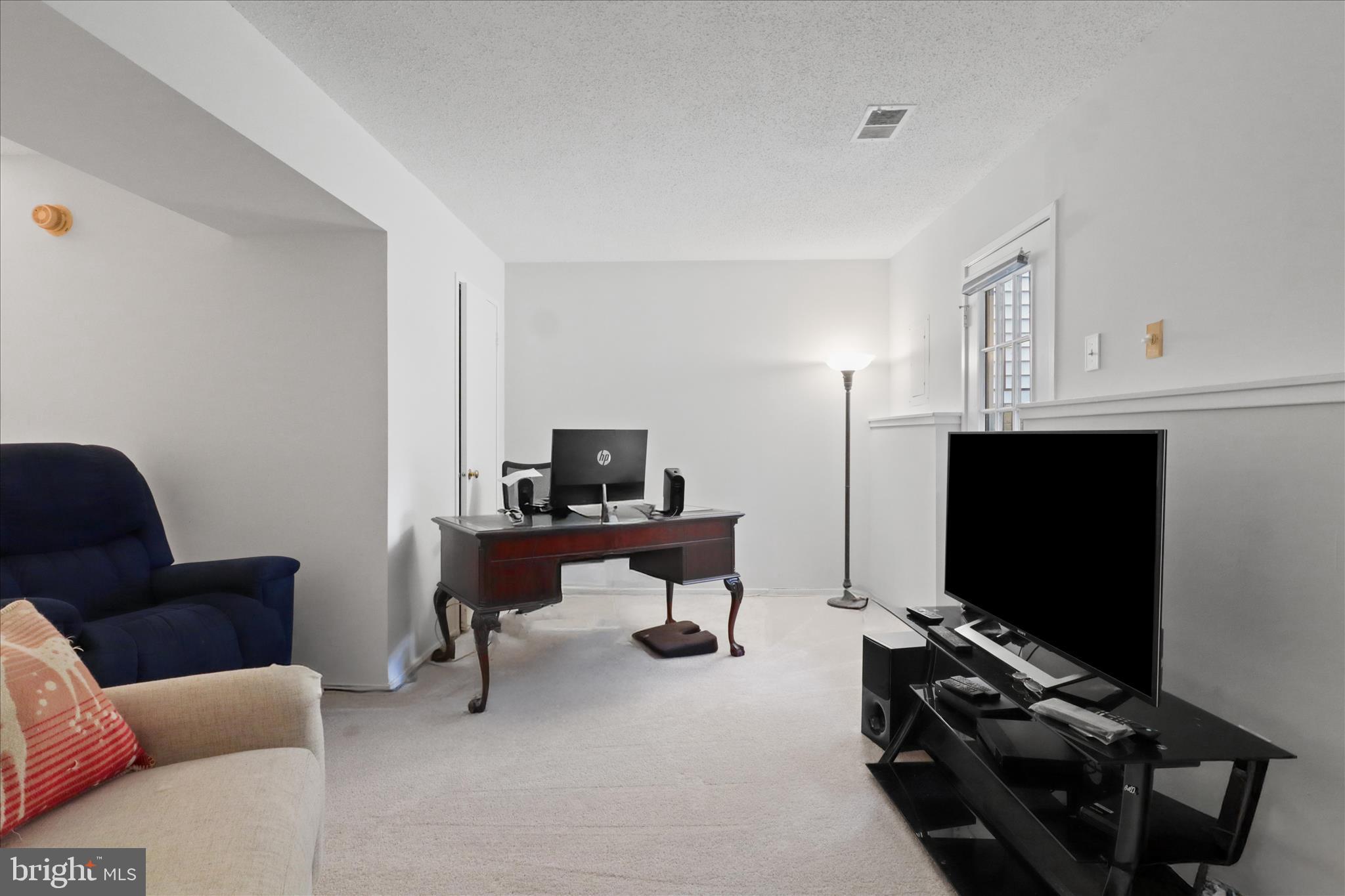 8927 Waites Way Lorton, VA 22079 - Photo 24 of 45 Bedroom 3 /flex room on lower level w fireplace