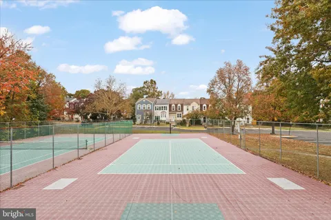 a view of an outdoor space and tennis court