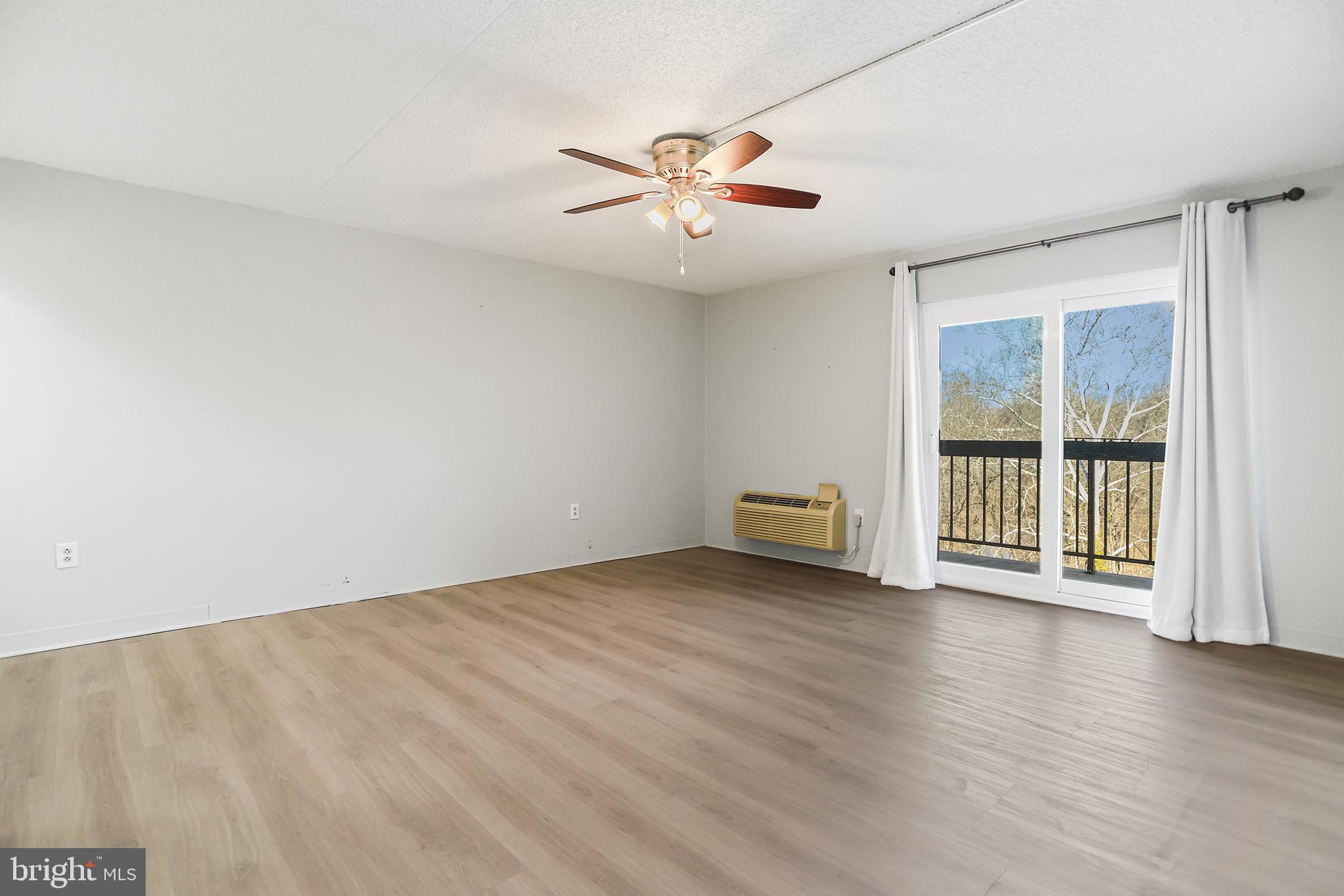 800 Avondale Road, Unit 6J Wallingford, PA 19086 - Photo 18 of 28 Bright and airy space with outdoor access.