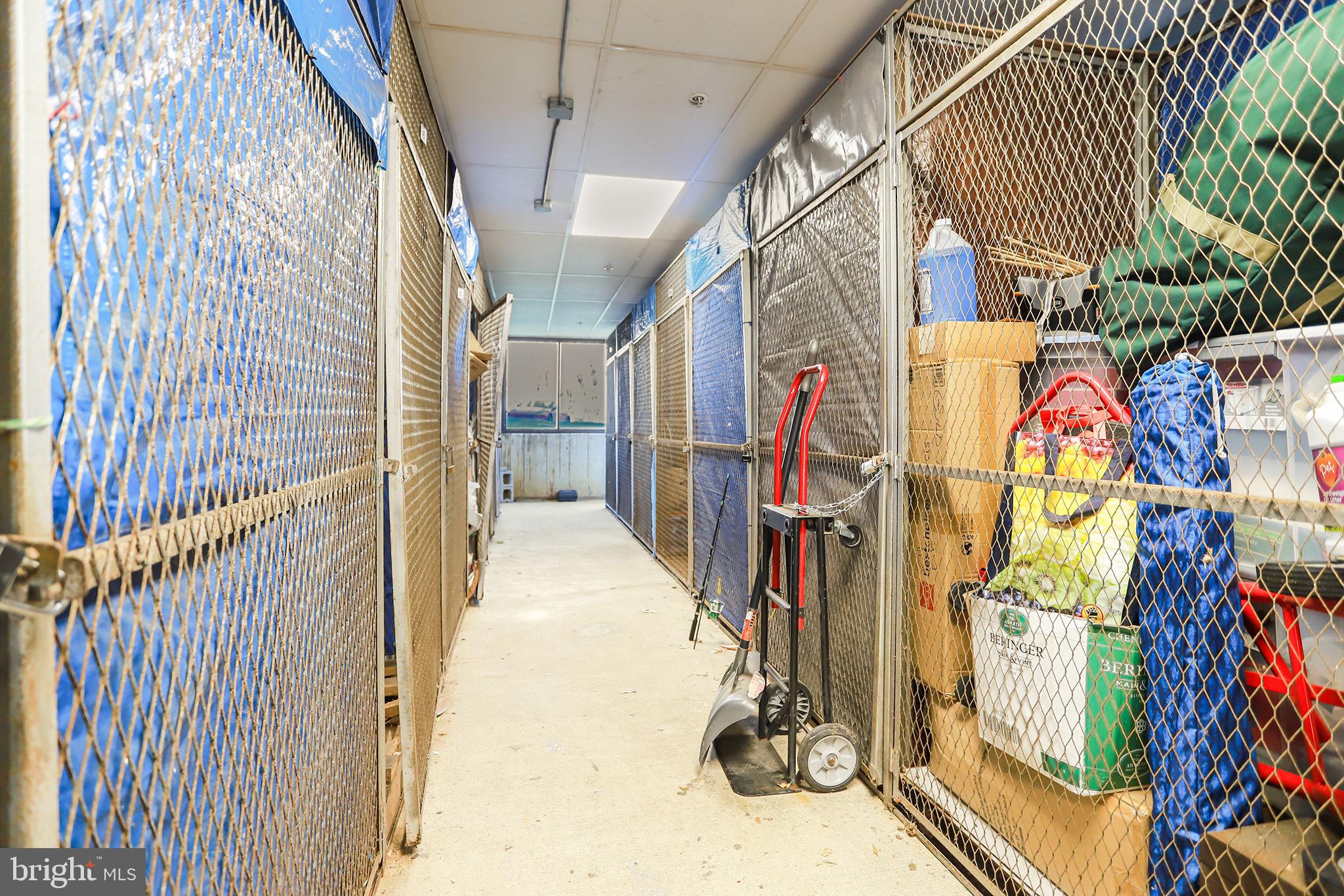 800 Avondale Road, Unit 6J Wallingford, PA 19086 - Photo 27 of 28 Storage corridor with organized spaces.