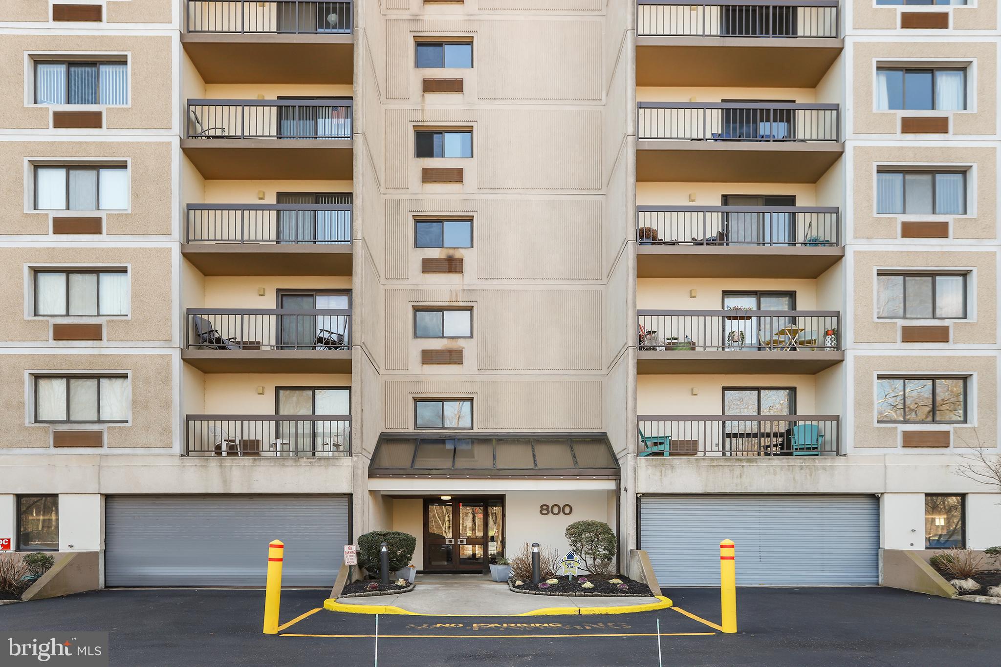 800 Avondale Road, Unit 6J Wallingford, PA 19086 - Photo 3 of 28 Modern apartment building with inviting entrance.