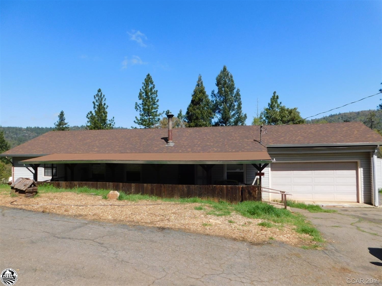 330 Higdon Road West Point, CA 95255 - Photo 1 of 31 a house with trees in the background